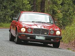 Image result for Sebring Red 1986 Jaguar