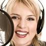 Natural station voice trend - female-singer-voice-over-recording-studio-microphone-windscreen-headphones-2