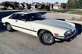 Image result for Nimbus White 1987 Jaguar