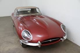 Image result for Maroon 1962 Jaguar