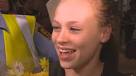 Gymnast Ellie Black was overcome with emotion as she arrived to hugs, ... - image