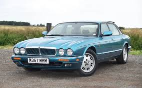 Image result for Bright Turquoise 1995 Jaguar
