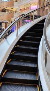 Image result for spiral escalator