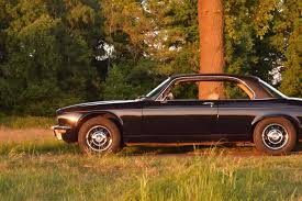 Image result for Carriage Brown 1977 Jaguar