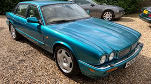 Image result for Bright Turquoise 1995 Jaguar