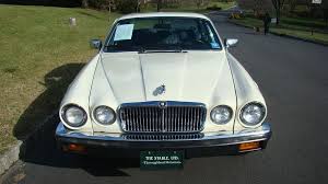 Image result for Nimbus White 1987 Jaguar