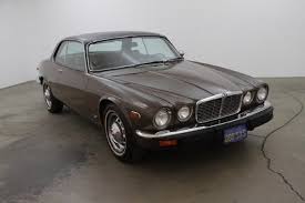 Image result for Carriage Brown 1977 Jaguar