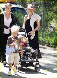 Image result for Queen B by Bumbleride $428 Gwen Stefani and Gavin Rossdale with Kingston and Zuma at the LA zoo