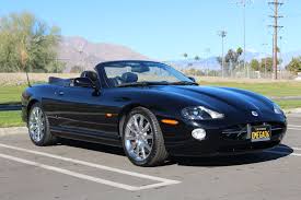 Image result for Black Cherry 2006 Jaguar