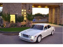 Image result for Nimbus White 1987 Jaguar