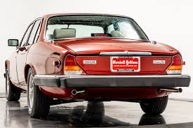 Image result for Burgundy 1983 Jaguar