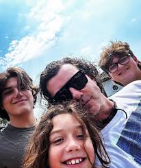 Image result for Queen B by Bumbleride $428 Gwen Stefani and Gavin Rossdale with Kingston and Zuma at the LA zoo