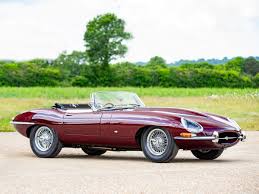Image result for Maroon 1962 Jaguar