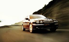 Image result for White Onyx 2002 Jaguar