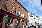 A large pub serving good real ale. High Street, Hastings - via Daymix