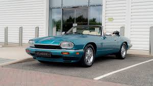 Image result for Bright Turquoise 1995 Jaguar