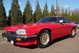 Image result for Sebring Red 1986 Jaguar