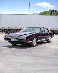 Image result for Maroon 1962 Jaguar