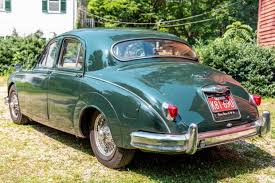 Image result for Dark Green 1959 Jaguar