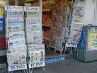 papers include USA Today - via Daymix