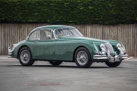 Image result for Dark Green 1959 Jaguar
