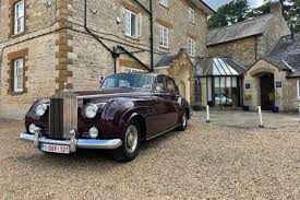 Image result for Rolls-Royce Badminton Club