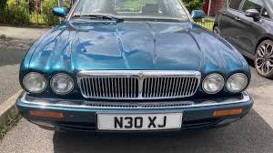 Image result for Bright Turquoise 1995 Jaguar