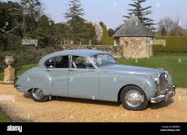 Image result for Silver Blue 1959 Jaguar
