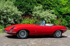 Image result for Carmen Red 1961 Jaguar