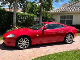 Image result for Persian Red Pearl 2008 Jaguar