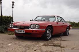 Image result for Sebring Red 1986 Jaguar