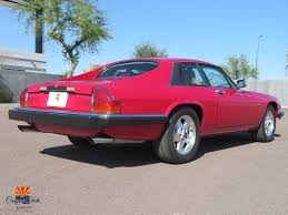 Image result for Sebring Red 1986 Jaguar