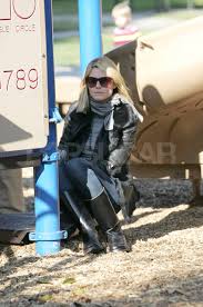 Image result for Easywalker QTRO with Carrycot Seal and Heidi Klum