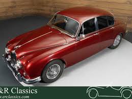 Image result for Maroon 1962 Jaguar