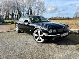 Image result for Black Cherry 2006 Jaguar