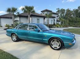 Image result for Bright Turquoise 1995 Jaguar