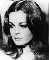 ... looking like an old-fashioned pinup girl or a bit like Romy Schneider. - romy_schneider