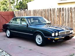 Image result for Alpine Green 1999 Jaguar