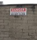 Sign high up on a wall at the end of Robbins Lane. At the time the photo was - via Daymix