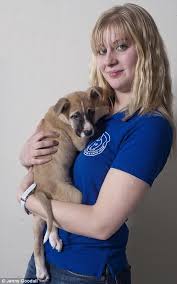 Gemma Walton and Prancer, one of the litter of 8 mongrel puppies at Battersea Dogs - article-2077776-0F3F580800000578-182_470x754