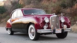Image result for Silver Blue 1959 Jaguar