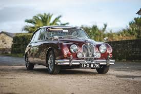 Image result for Maroon 1962 Jaguar