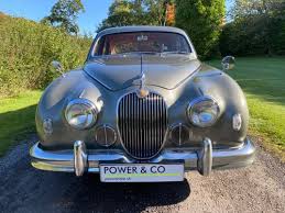 Image result for Silver Blue 1959 Jaguar