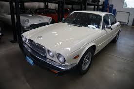 Image result for Nimbus White 1987 Jaguar