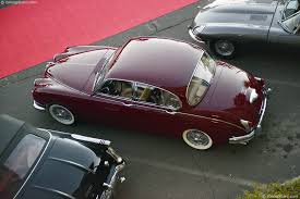 Image result for Maroon 1962 Jaguar