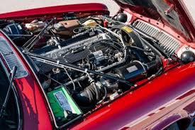 Image result for Grenadier Red 1987 Jaguar