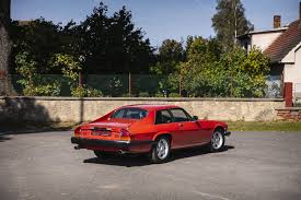 Image result for Sebring Red 1986 Jaguar