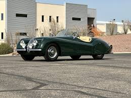 Image result for Poseidon Dark Green 1979 Jaguar