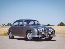 Image result for Silver Blue 1959 Jaguar