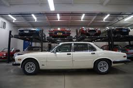 Image result for Nimbus White 1987 Jaguar